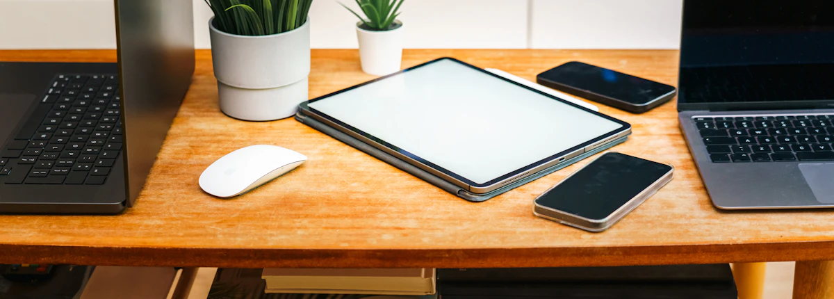 Responsive website design displayed across a laptop, tablet, and smartphone
