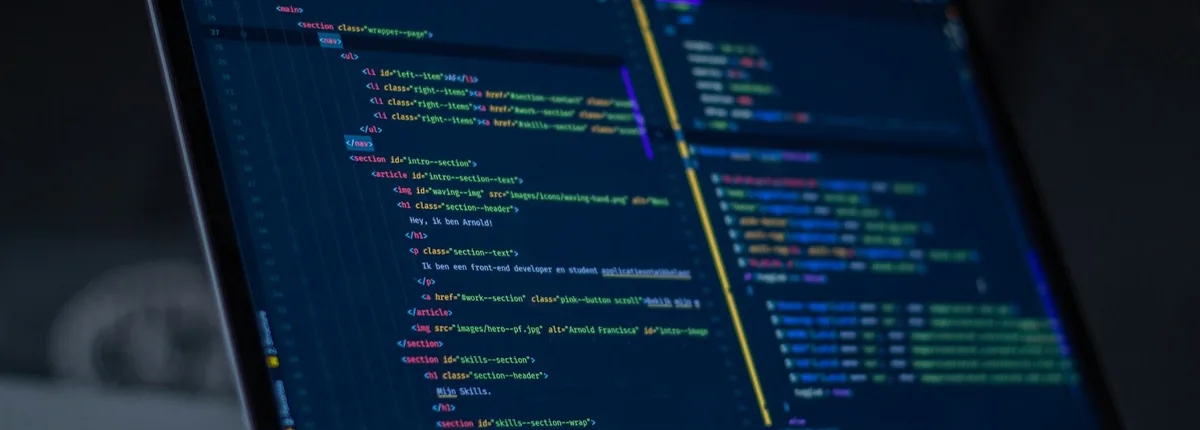 Laptop screen displaying a custom web application development code editor