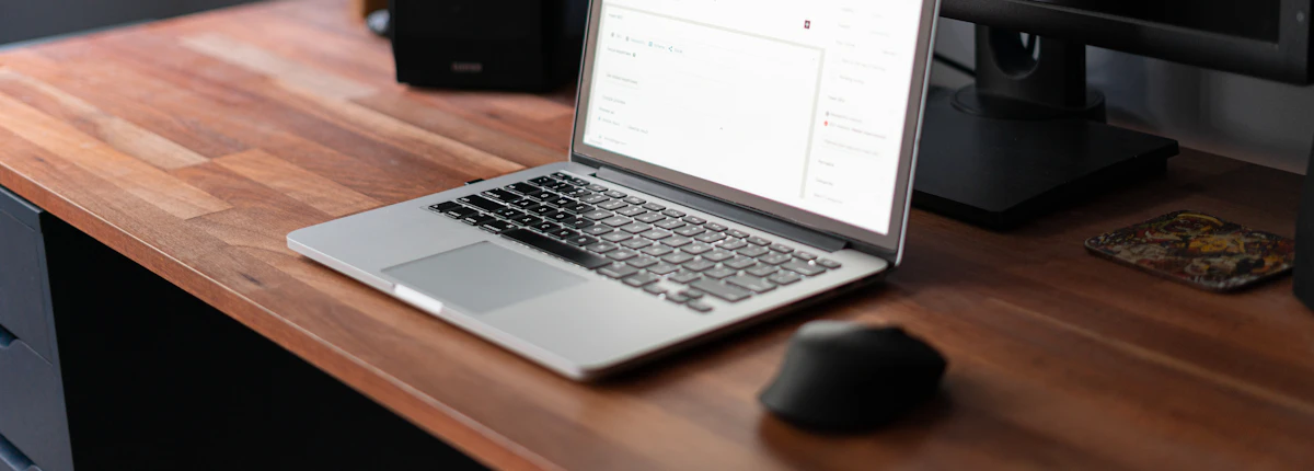 Laptop on a desk displaying a WordPress website dashboard